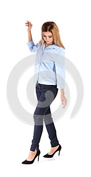 Full length portrait of businesswoman balancing
