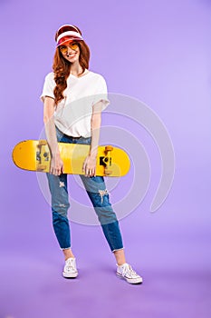 Full length portrait of a cheerful young girl