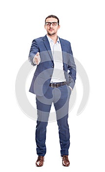 Full length portrait of confident businessman giving handshake greeting isolated on white background. Boss salute employee with