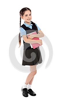 Full length portrait of cute girl in school uniform with books
