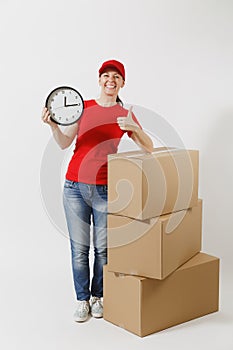 Full length portrait of delivery woman in red cap, t-shirt isolated on white background. Female courier near empty