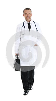 Full length portrait of experienced doctor in uniform on white background