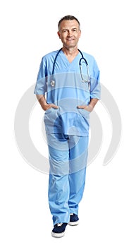 Full length portrait of experienced doctor in uniform on white background