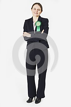 Full Length Portrait Of Female Politician Wearing Green Rosette photo