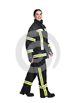 Full length portrait of firefighter in uniform on white