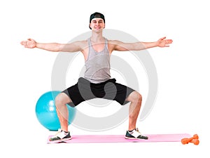 Full length portrait of a fit young man over white