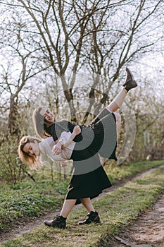 Full length portrait, the girl holds another girl on her back, Having fun together, positive emotions, bright colors. two
