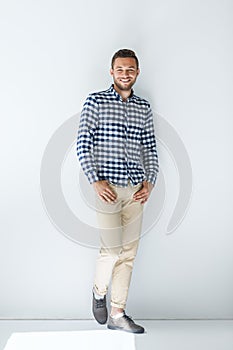 Full length portrait of handsome stylish man in casual clothes