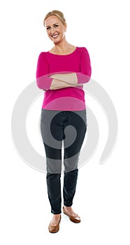 Full length portrait of happy aged woman posing