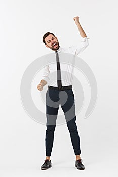 Full-length portrait of happy businessman in formal wear with raising hands up.  on white background.