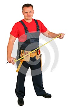 Full length portrait of an happy caucasian construction worker isolated on white background. Smiling handsome plumber. Handyman is