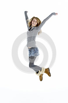 Full Length Portrait Of Jumping Teenage Girl