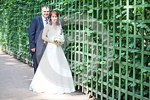 Full length portrait of just merried couple