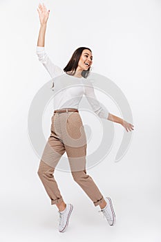 Full length portrait of a laughing asian businesswoman