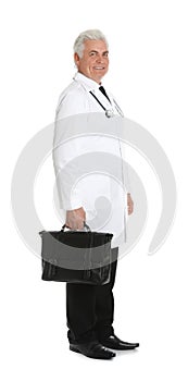 Full length portrait of male doctor with briefcase isolated on white