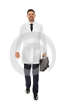 Full length portrait of male doctor with briefcase. Medical staff