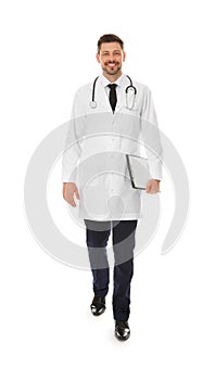 Full length portrait of male doctor with clipboard isolated. Medical staff