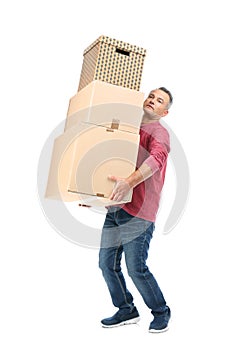 Full length portrait of mature man carrying carton boxes