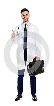 Full length portrait of medical doctor with bag