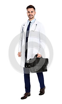 Full length portrait of medical doctor with bag isolated