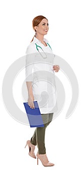 Full length portrait of medical doctor with clipboard and stethoscope