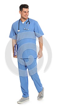 Full length portrait of medical doctor with clipboard and stethoscope