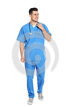 Full length portrait of medical doctor with stethoscope isolated