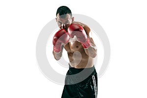 Full length portrait of muscular sportsman with prosthetic leg, copy space. Male boxer in red gloves.