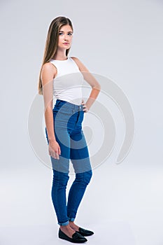 Full length portrait of a serious female teenager