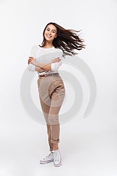 Full length portrait of a smiling asian businesswoman