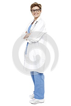 Full length portrait of a smiling female doctor