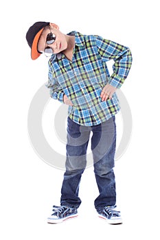 Full length portrait of smiling little boy in jeans