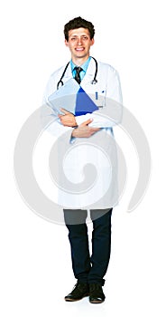 Full length portrait of a smiling male doctor holding a notepad