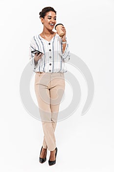 Full length portrait of a smiling young african businesswoman
