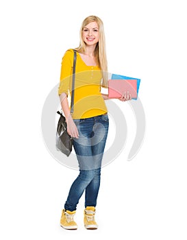 Full length portrait of student girl with books