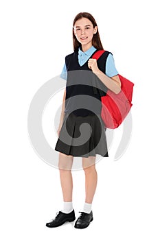 Full length portrait of teenage girl in school uniform with backpack