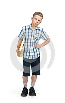 A full-length portrait of a teenager in a plaid shirt, shorts and with books in his hand, isolated on white background.