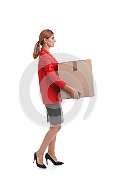 Full length portrait of woman carrying carton box