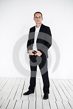 Full length portrait of a young businessman standing
