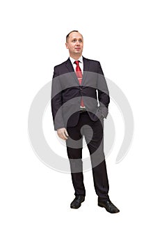 Full length portrait of a young businessman standing with his hands in the pockets. Isolated on white. Clipping path