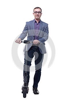 Full length portrait of young businessman standing with scooter