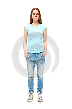 Full length portrait of young girl in casual clothing isolated