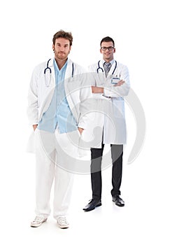 Full length portrait of young male doctors