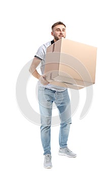 Full length portrait of young man carrying carton box