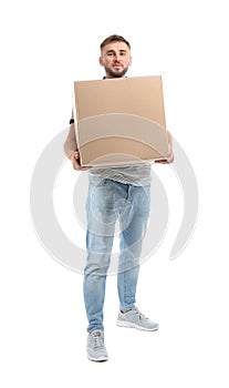 Full length portrait of young man carrying carton box on white background.