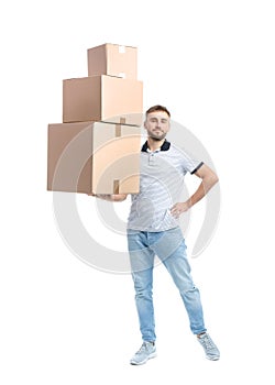 Full length portrait of young man holding carton boxes