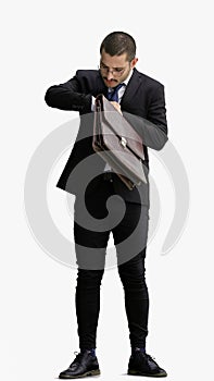 full-length portrait of a young man. standing isolated on white background