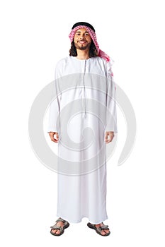 Full-length portrait of young middle-east man in thobe dress on white background