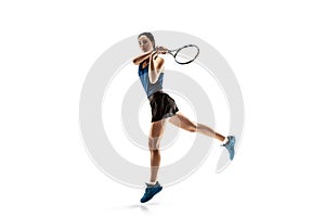 Full length portrait of young woman playing tennis isolated on white background