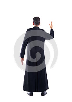 Full length priest blessing arm rear view